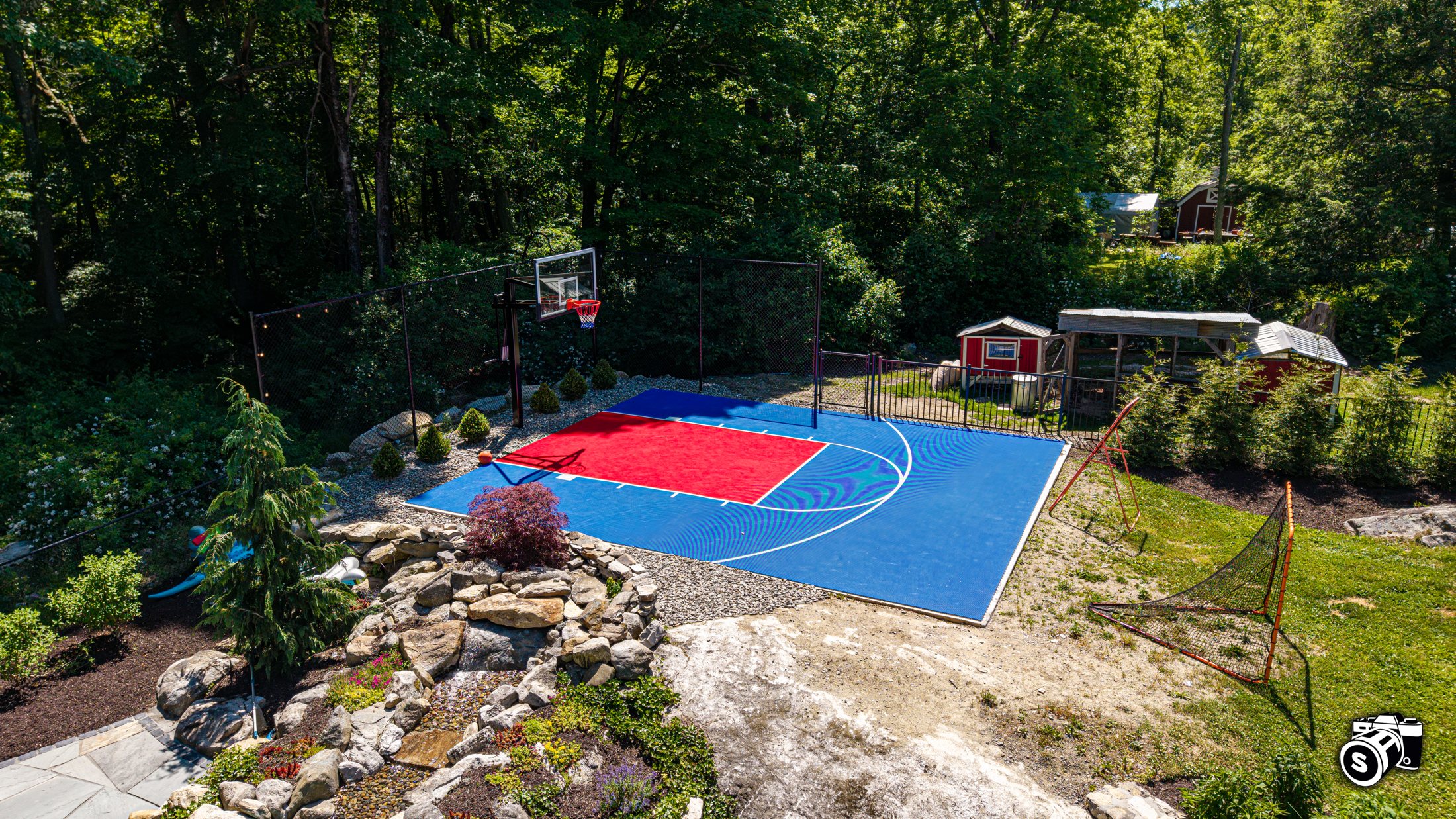 Sport court framed by stonework