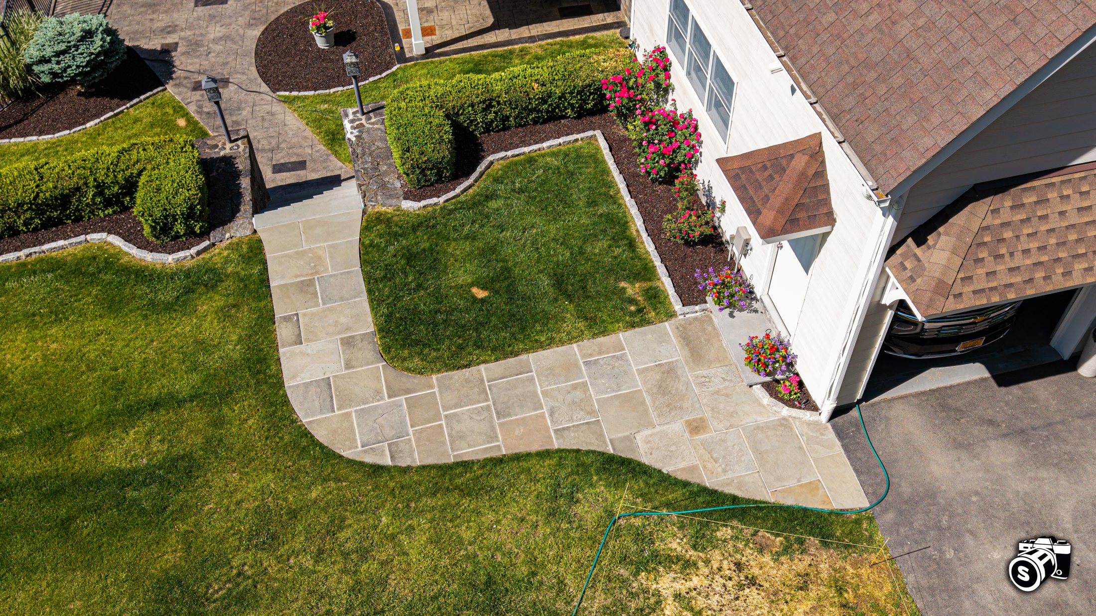 Bluestone walkway with planted beds