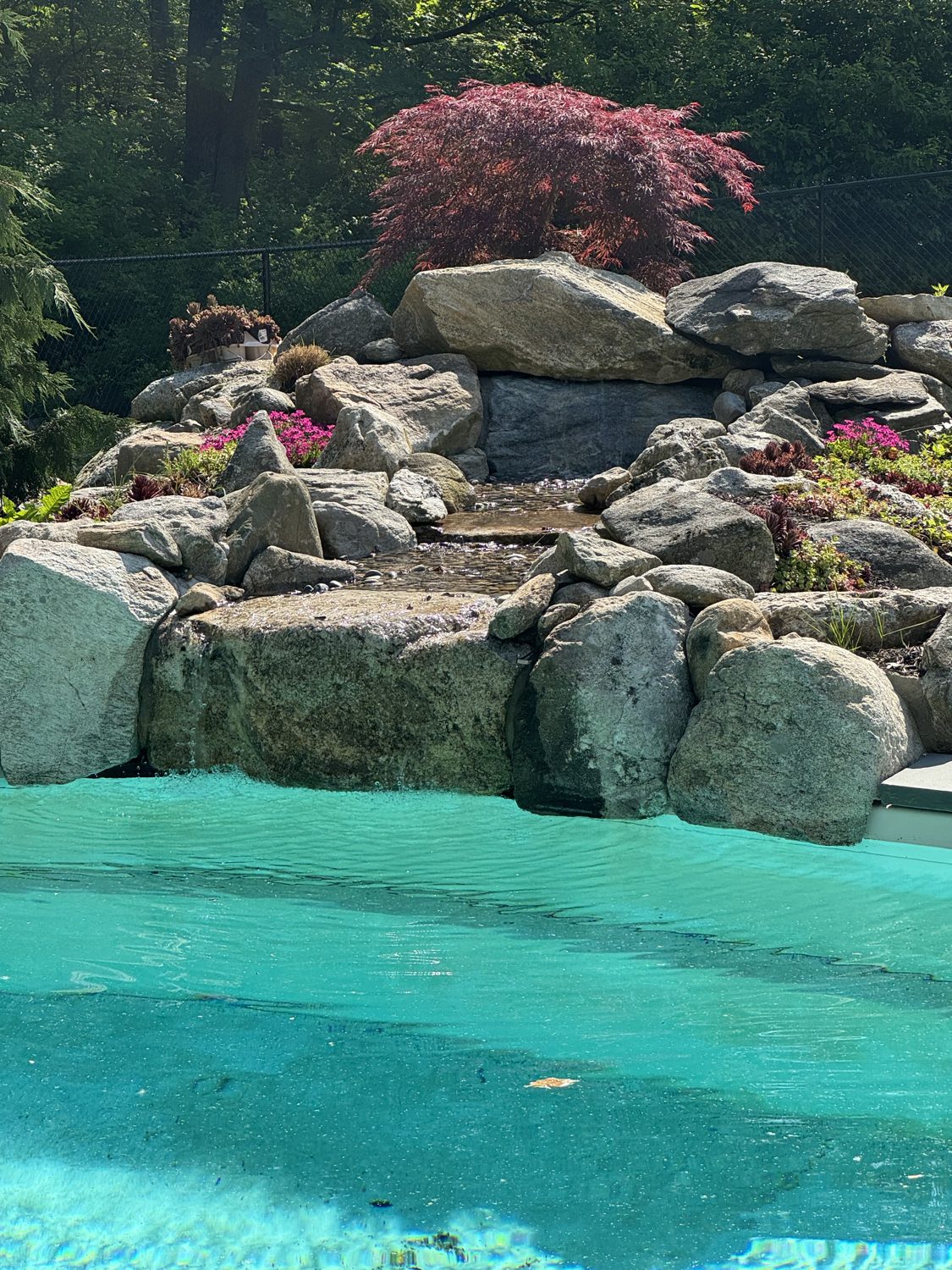 Hand-built natural rock waterfall