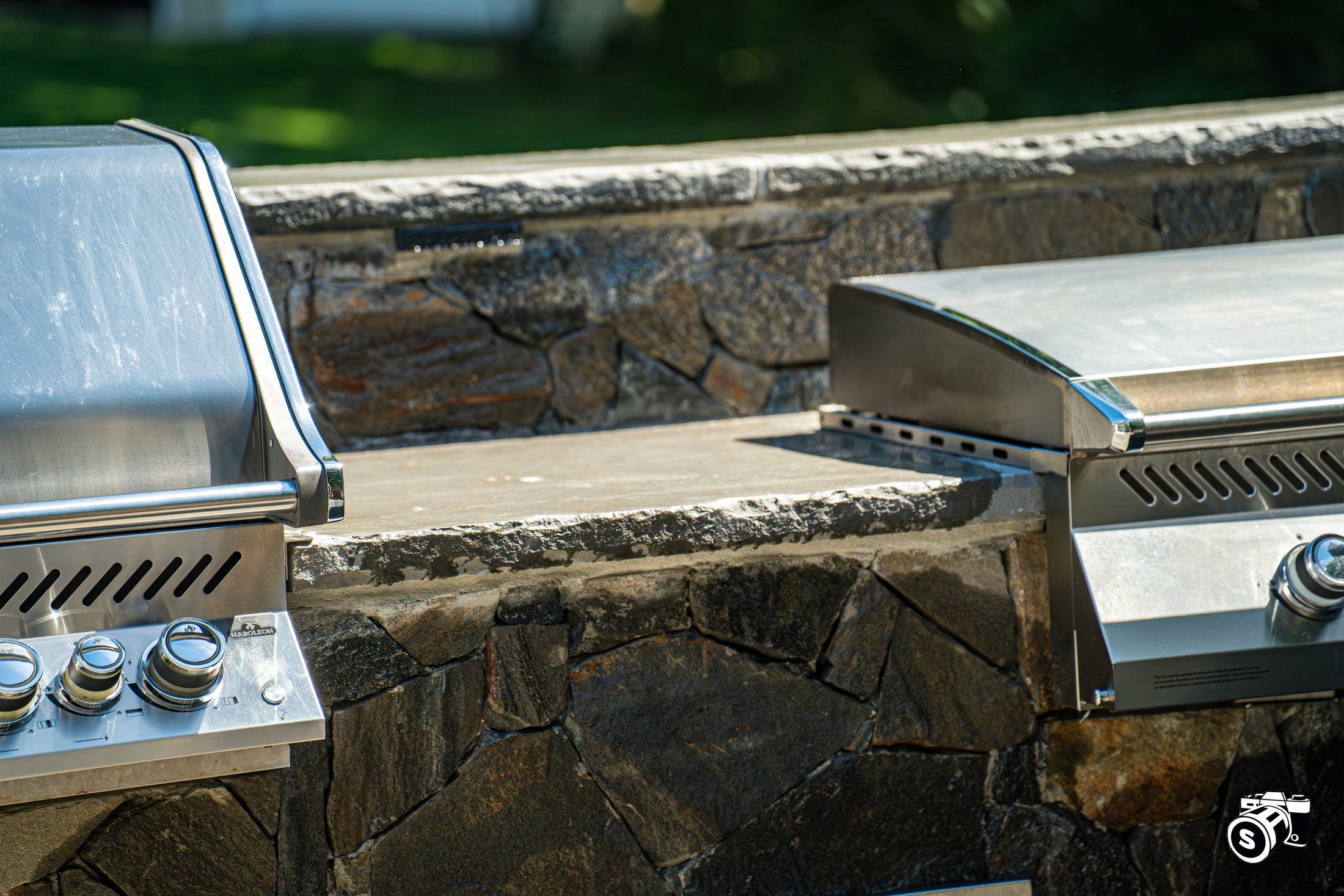 Built-in grill set in a stone counter