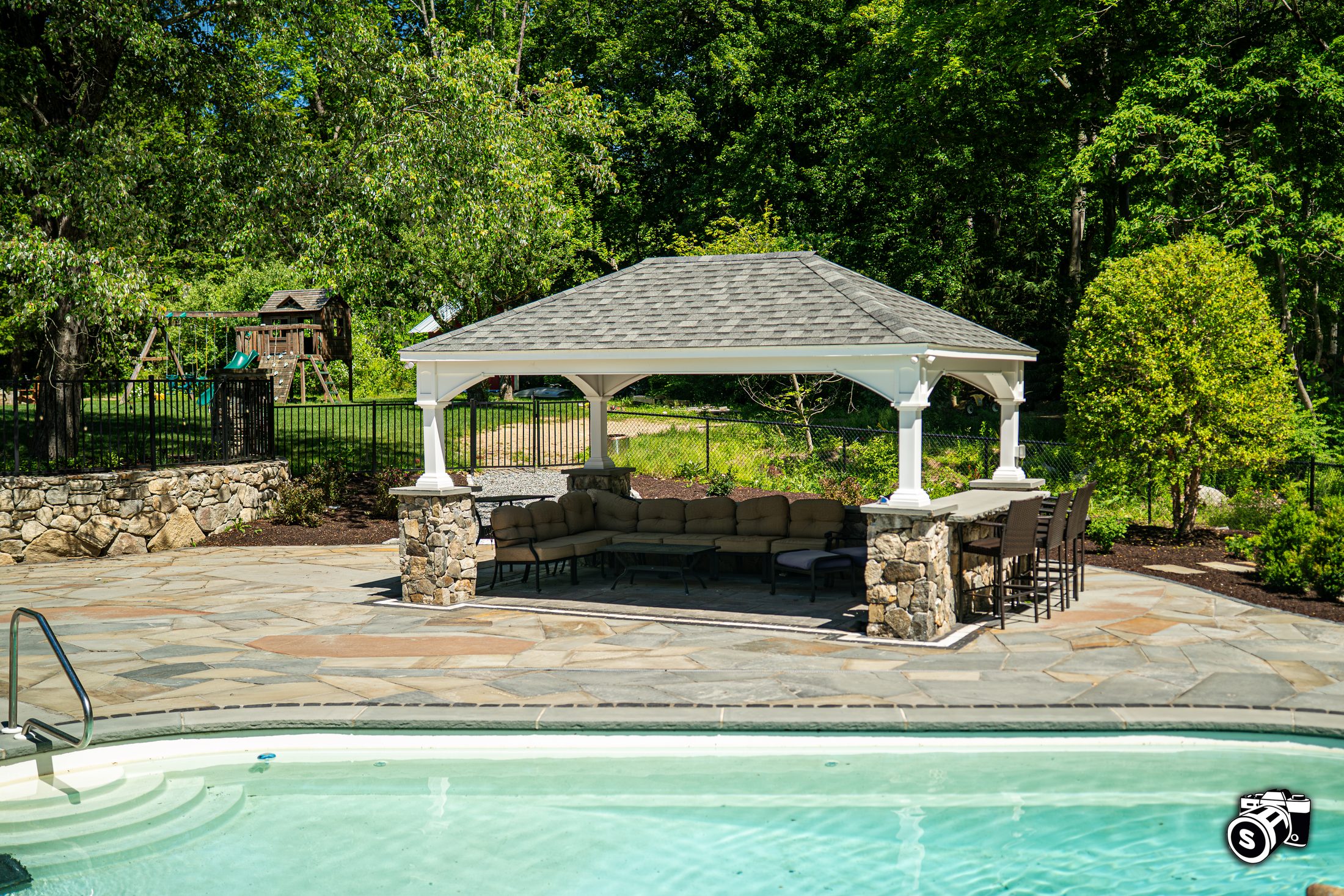 Pool-edge stone veneer detail